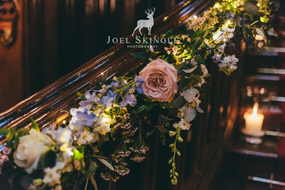 Close up staircase wedding flowers by Twisted Willow Floristry