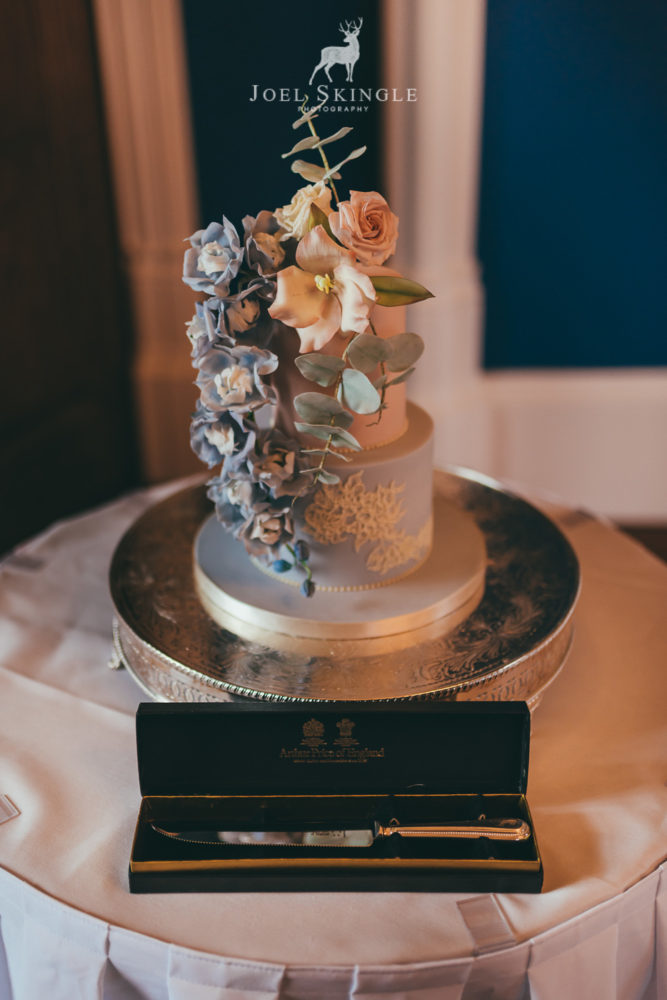 Blush pink and dusty blue wedding cake