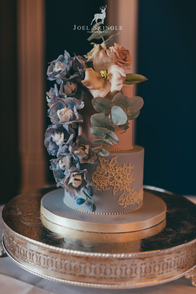 Blush pink and pastel blue floral wedding cake