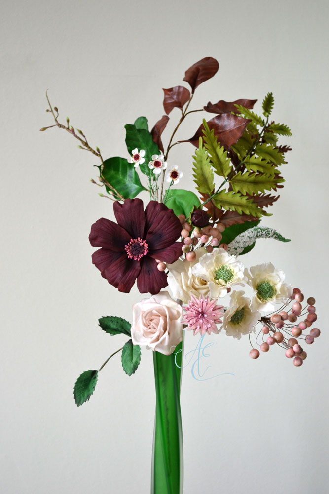 Chocolate Cosmos, Roses, Scabious, Astrantia, Waxflower, Snowberries and Foliage arrangement of sugar cosmos roses scabious astrantia waxflowers berries and foliage