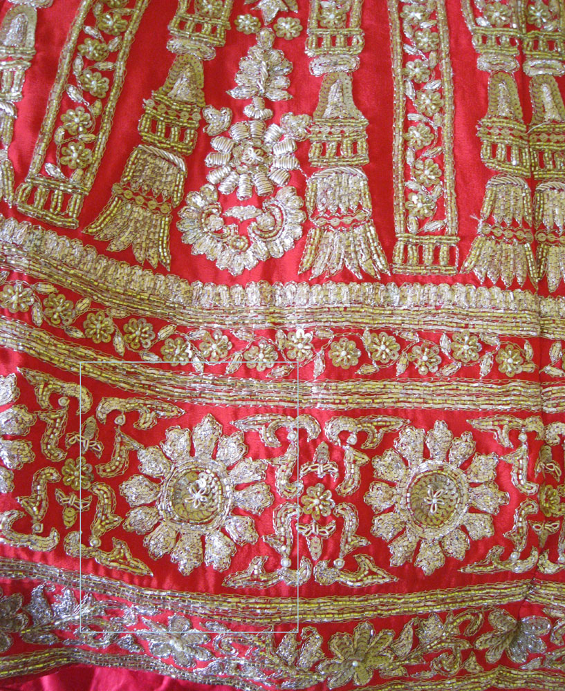 gold and red wedding dress skirt