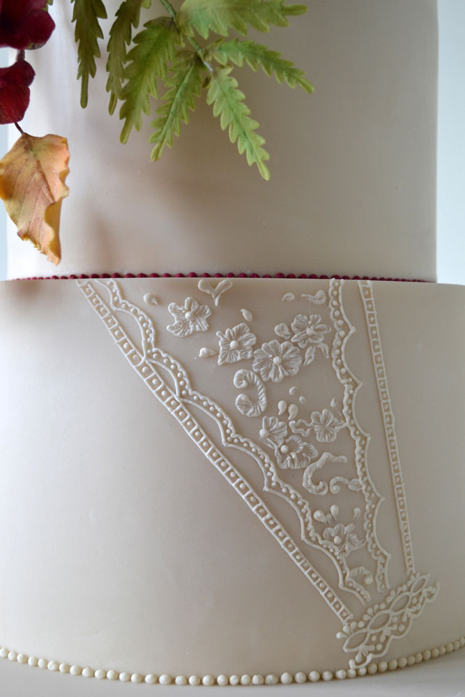 dress inspired royal icing piped lace