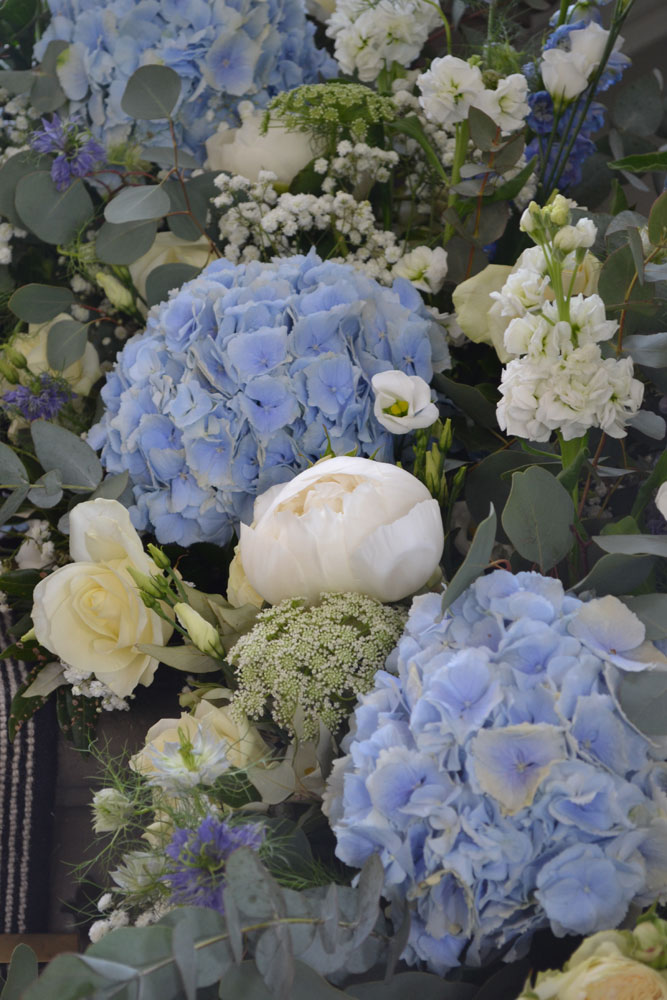close up blue white wedding flowers The Enchanted Florist