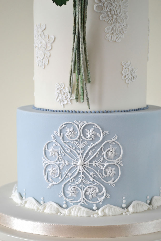 dress and plasterwork inspired royal icing piping