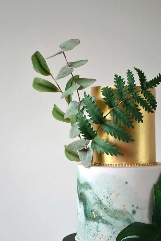 green and gold watercolour wedding cake