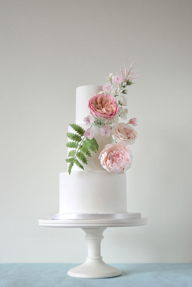 Pastel roses wedding cake
