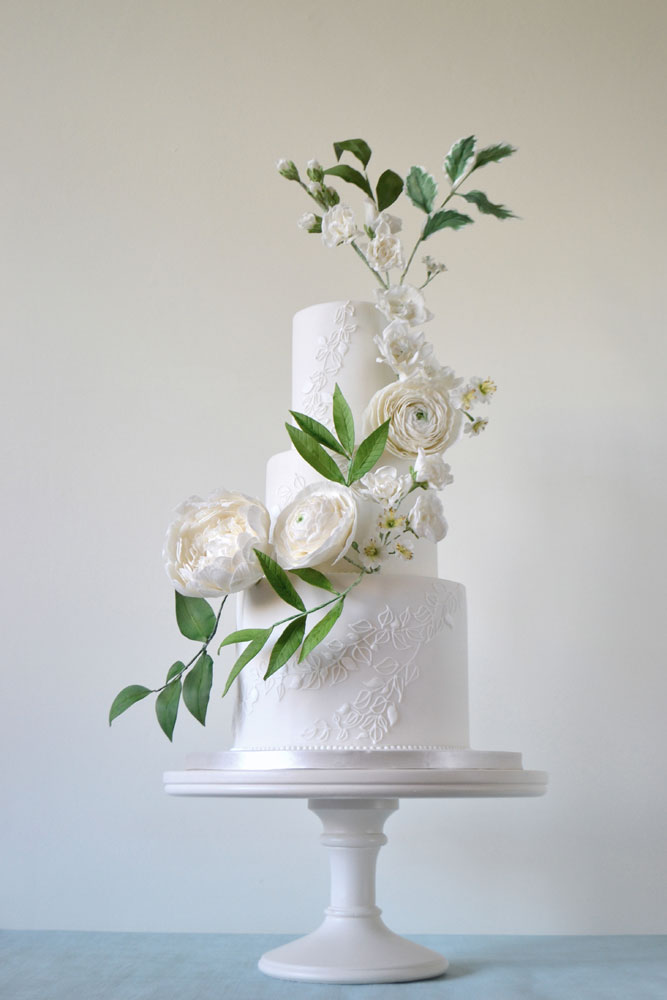 Wedding cake with 'S' cascade of sugar flowers
