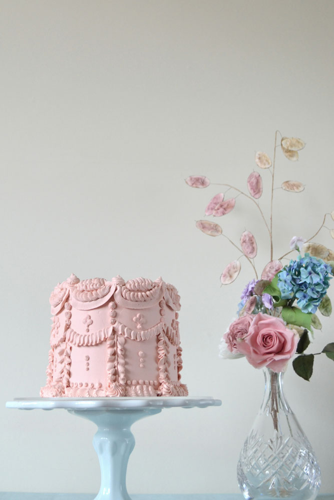 retro pink buttercream piped cake