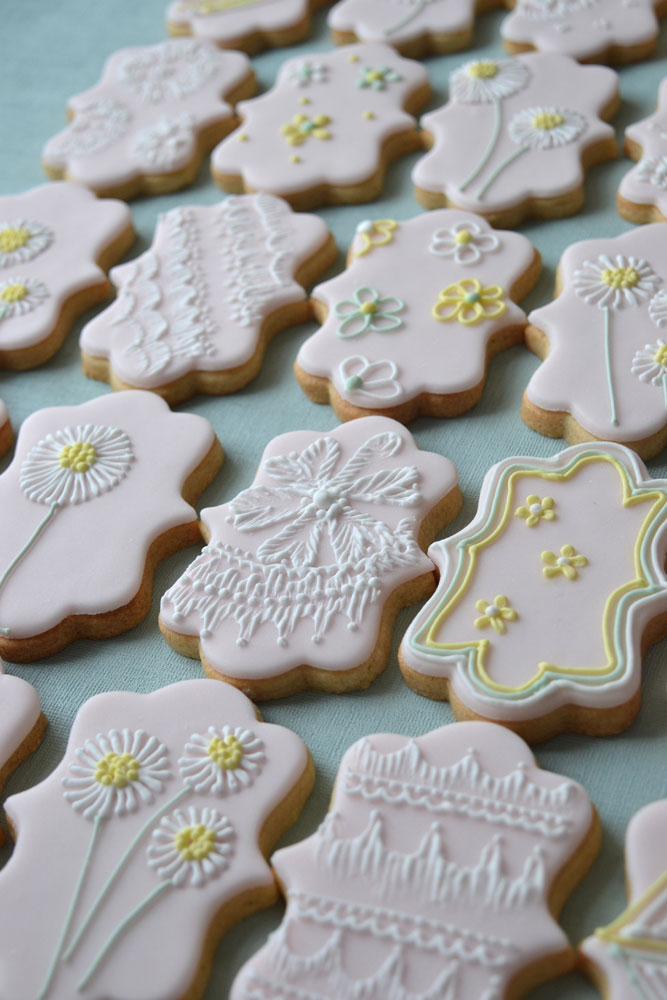 Hand piped iced biscuit favours