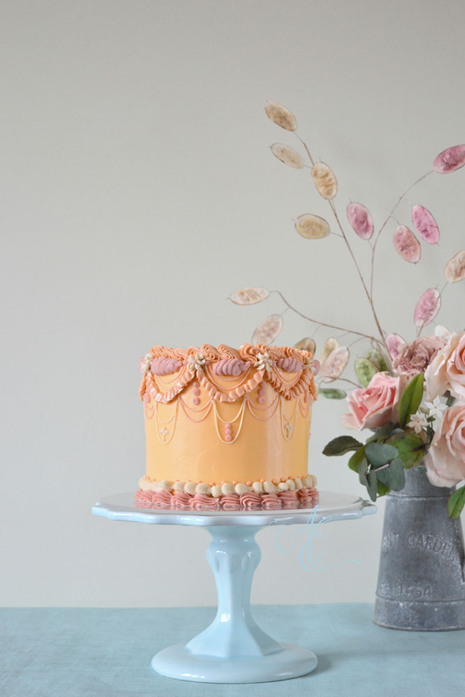 Penelope peach and pink vintage style cake